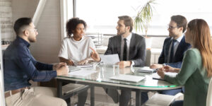 Employees meeting at conference table