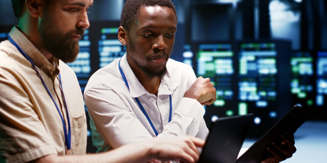 Coworkers overseeing supercomputers