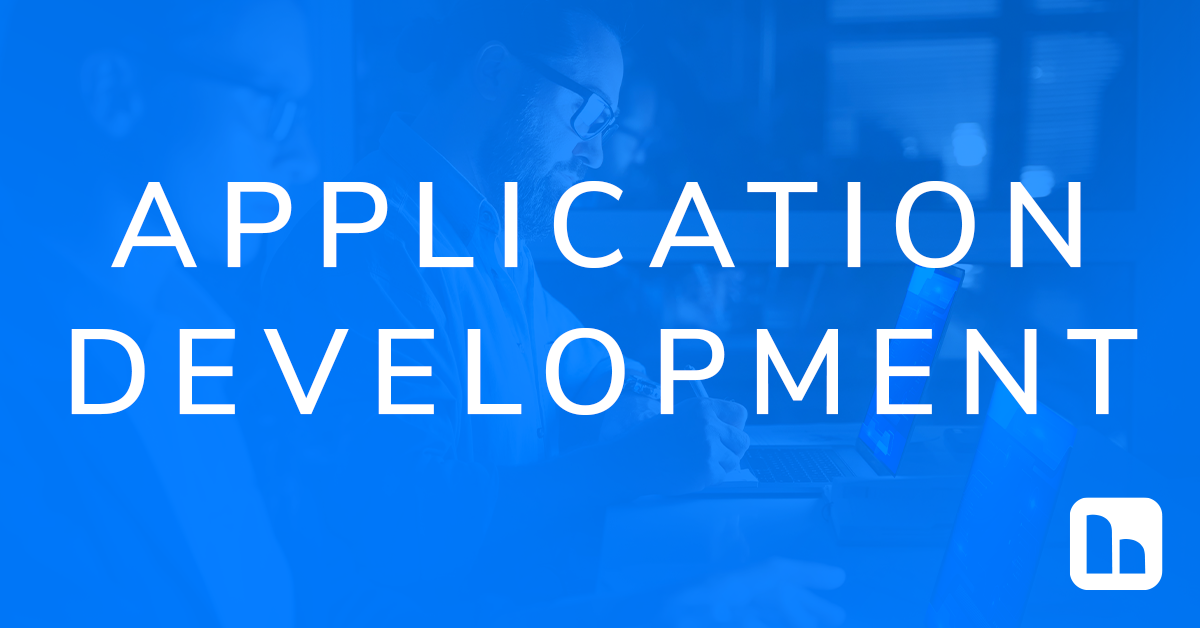 Application Development from HBS graphic. Blue gradient overlay over a photo of middle aged men working on laptops at a table. Application Development from HBS graphic. Blue gradient overlay over a photo of middle aged men working on laptops at a table.