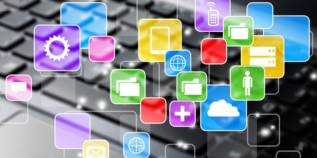 An abstract conceptual image of SaaS operations management featuring a variety of colorful app icons floating above a blurred computer keyboard. Icons include gears for settings, speech bubbles for communication, folders for file management, a globe for connectivity, a mobile device, a person for user management, clouds for cloud computing, and a medical cross for health services, all interconnected with thin lines, representing the integrated nature of software as a service platforms.