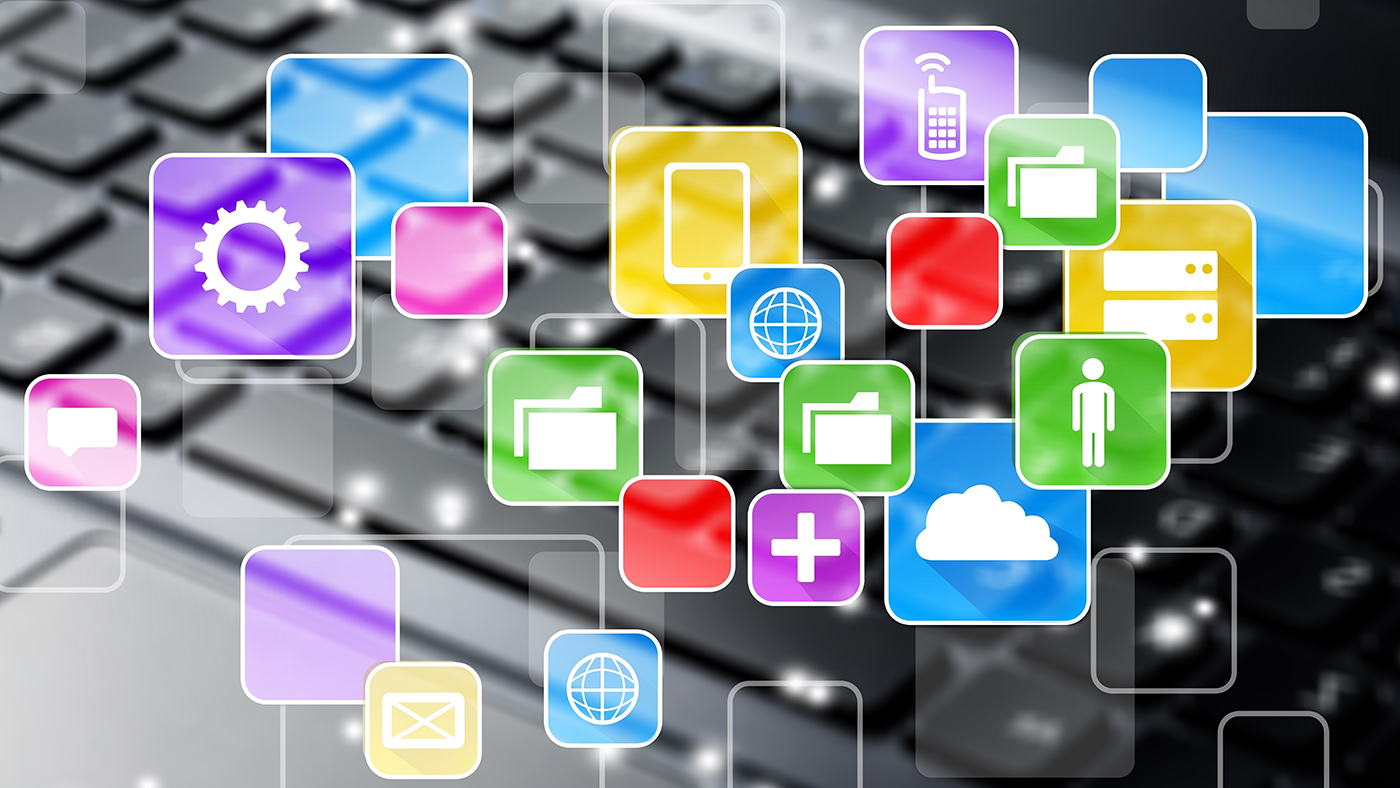 An abstract conceptual image of SaaS operations management featuring a variety of colorful app icons floating above a blurred computer keyboard. Icons include gears for settings, speech bubbles for communication, folders for file management, a globe for connectivity, a mobile device, a person for user management, clouds for cloud computing, and a medical cross for health services, all interconnected with thin lines, representing the integrated nature of software as a service platforms.