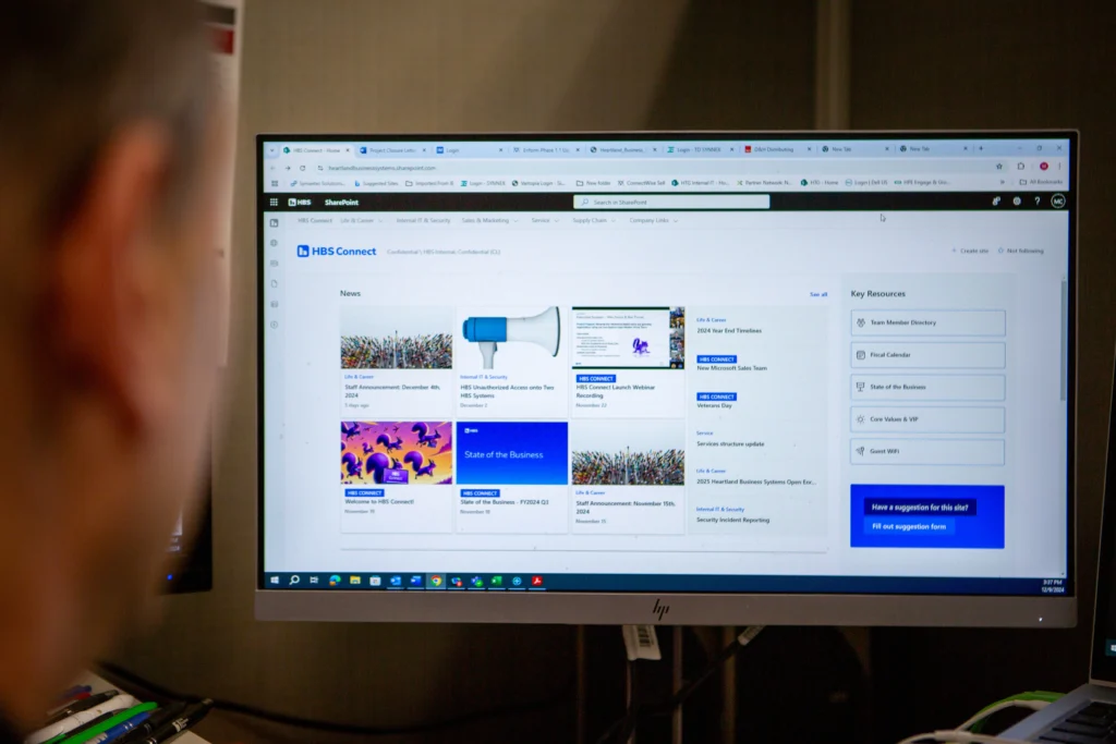 Employee viewing SharePoint site Employee viewing SharePoint site
