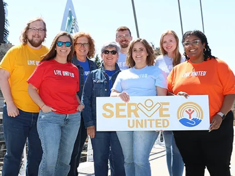 HBS Team in colorful Live United t-shirts, beginning a longstanding partnership with United Way.