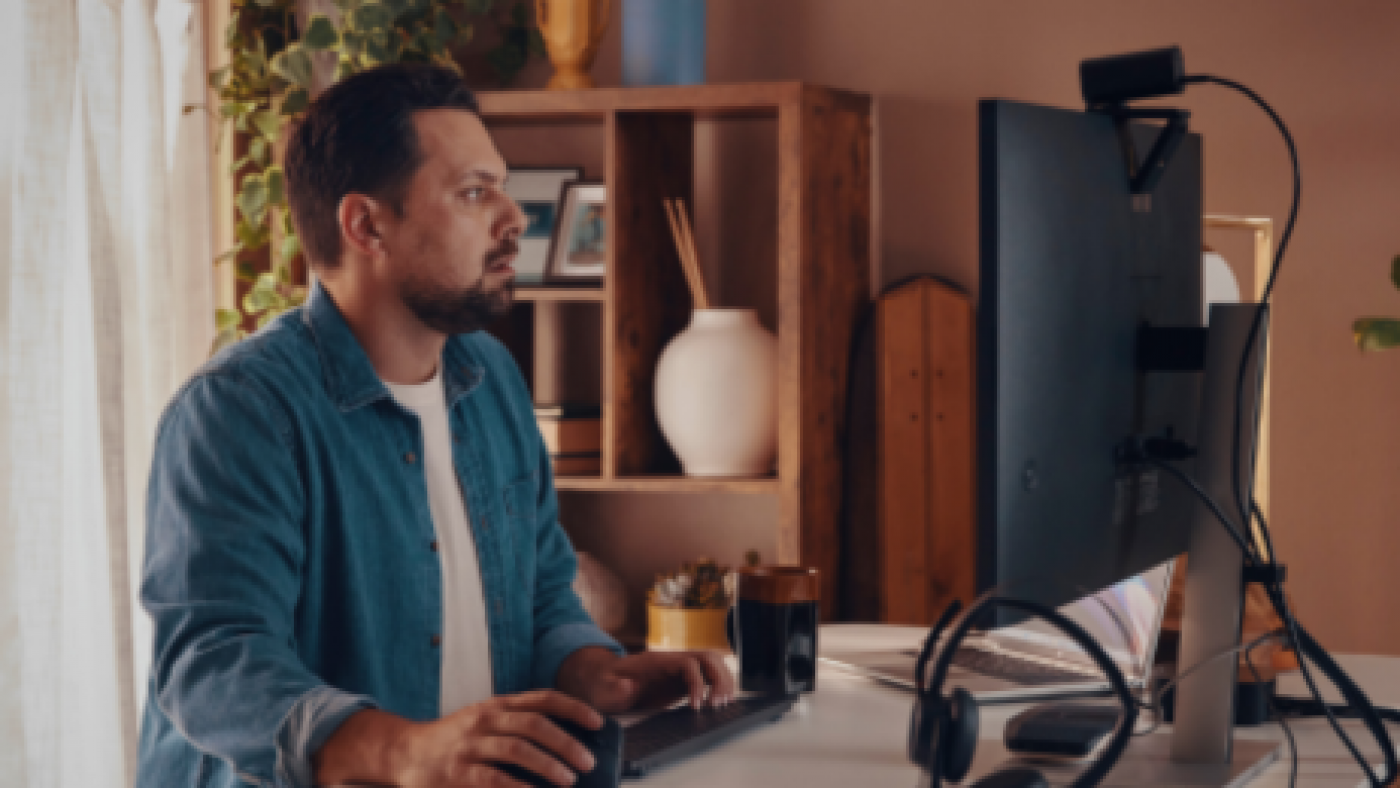 Man at an HP AI PC Desktop computer.